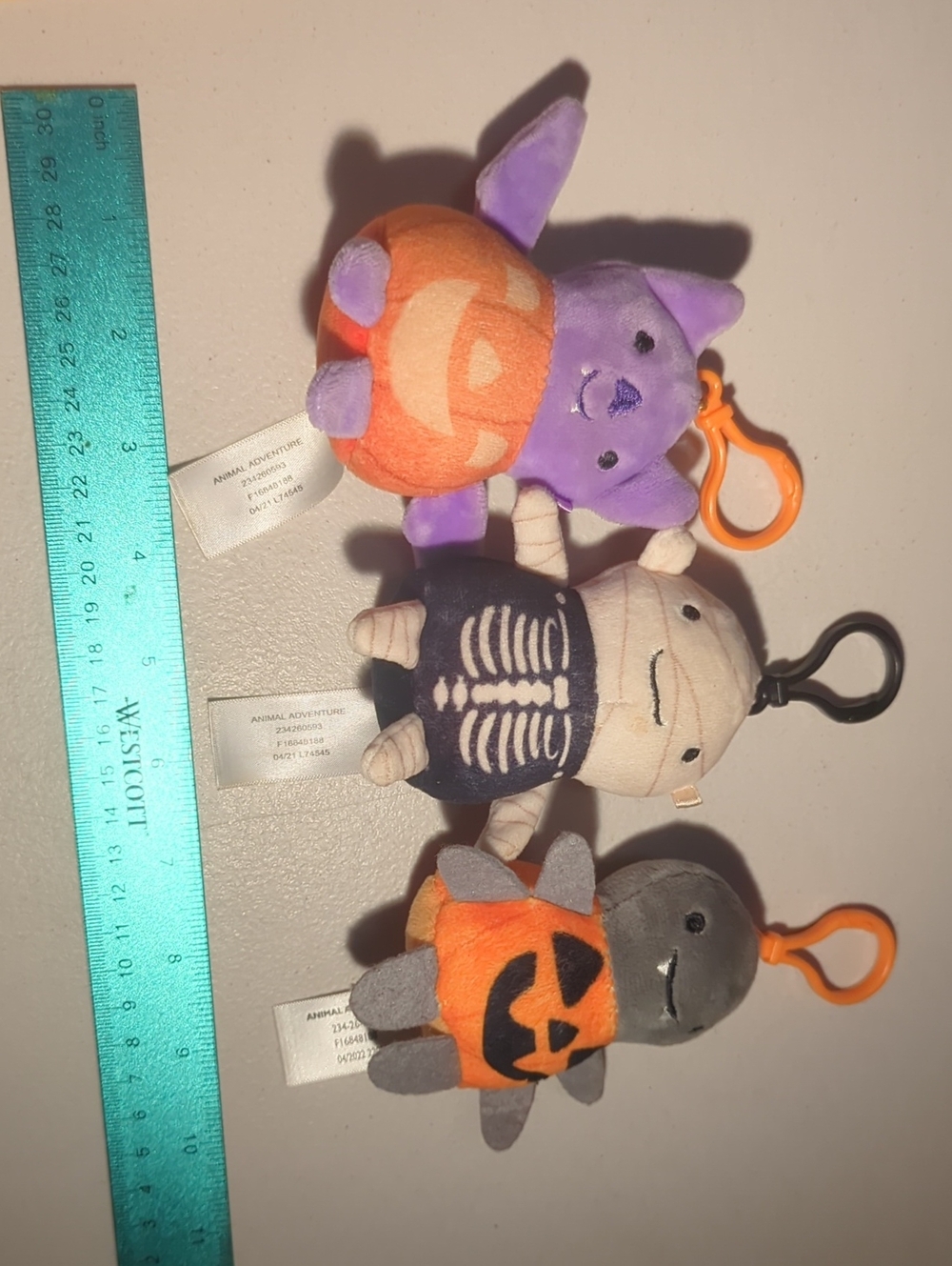 Cute Halloween Plush Keychain Set – Purple Bat, Black Skeleton & Gray Pumpkin
